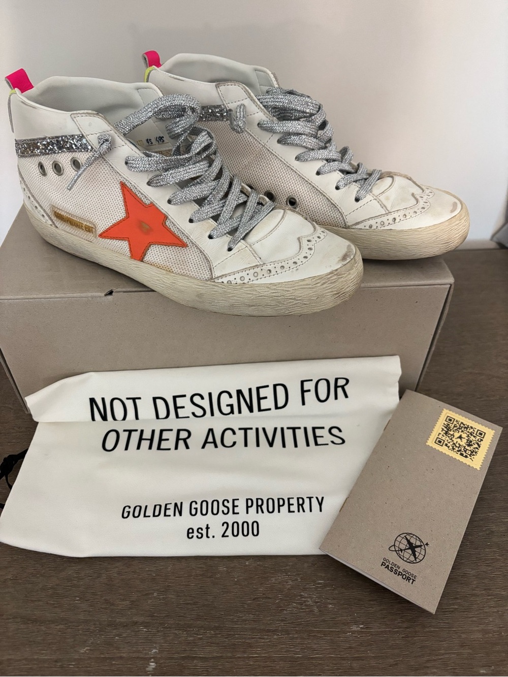 Golden Goose Women’s Midstar Hi-Top Sneakers in White with Orange Star; LTD. Ed.